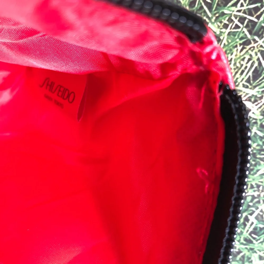 Shiseido Ginza Tokyo Red Makeup Bag with .33 oz Ultimune Deluxe Sample Included